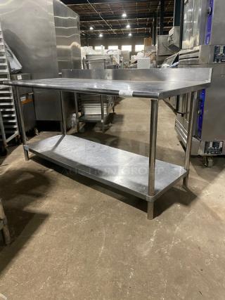 KCS commercial stainless steel worktop table with undershelf and up-turned backsplash on sturdy legs. Excellent condition.