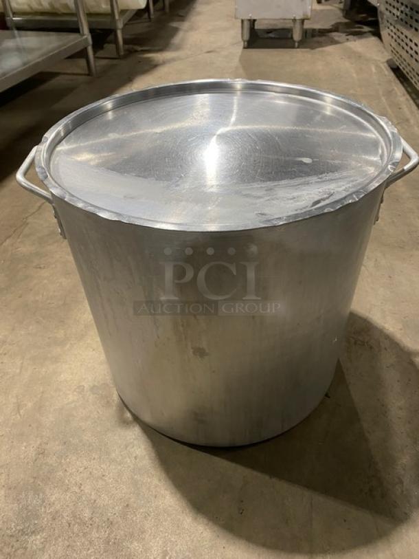 Heavy duty round stock pot with handles and lid, stainless steel, commercial grade, excellent condition.