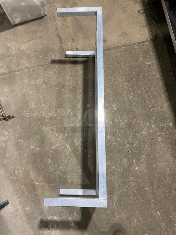 Commercial heavy duty dunnage rack with legs, metal construction, used for storage, excellent condition, durable design.