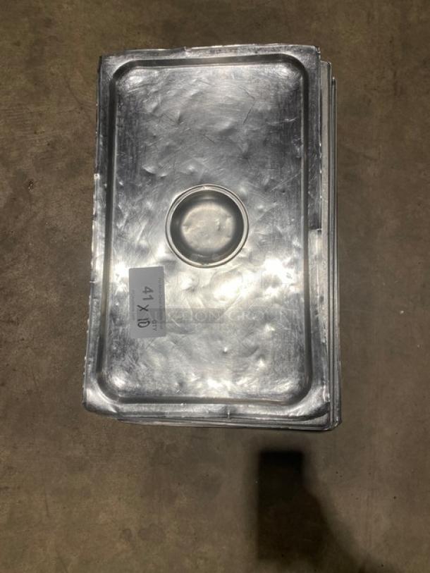 Commercial stainless steel hotel steamtable pan lid, rectangular with center handle. Good condition. Label reads "41X 0".