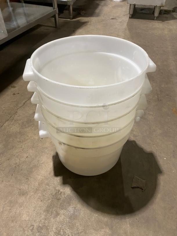 Commercial white round food storage containers, stackable with handles, five pieces, durable plastic, good condition.