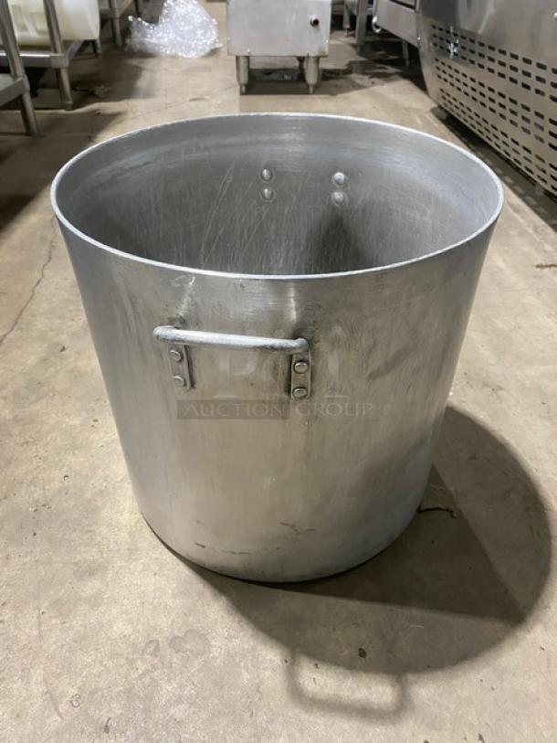 Commercial heavy-duty round stock pot with handles, in used condition, features durable metal construction, ideal for large-scale cooking.