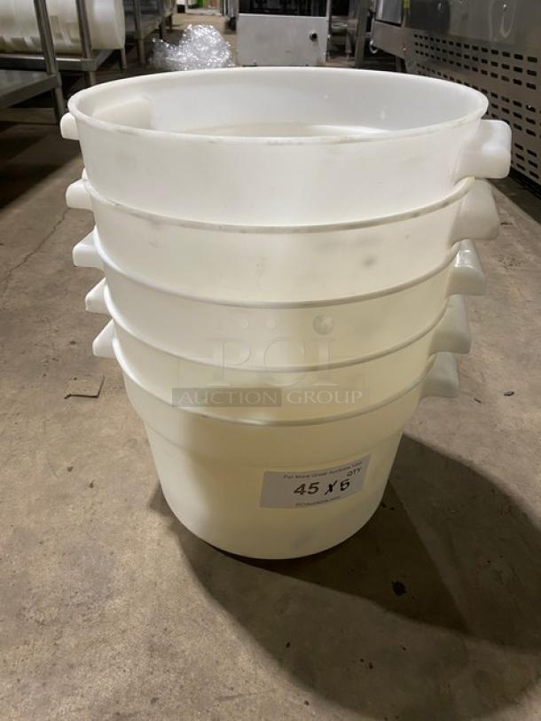 White round commercial food storage containers with handles, stacked. Good condition. Label indicates quantity "45 KG".