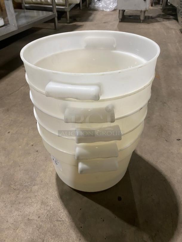 Commercial white round food storage containers with handles, stacked. Durable, clean condition. Ideal for bulk storage.