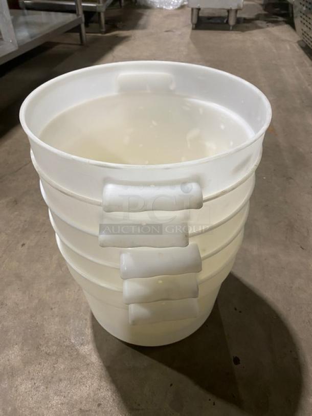 Commercial white round food storage containers with handles, stackable, in good condition. Five times the bidding value.