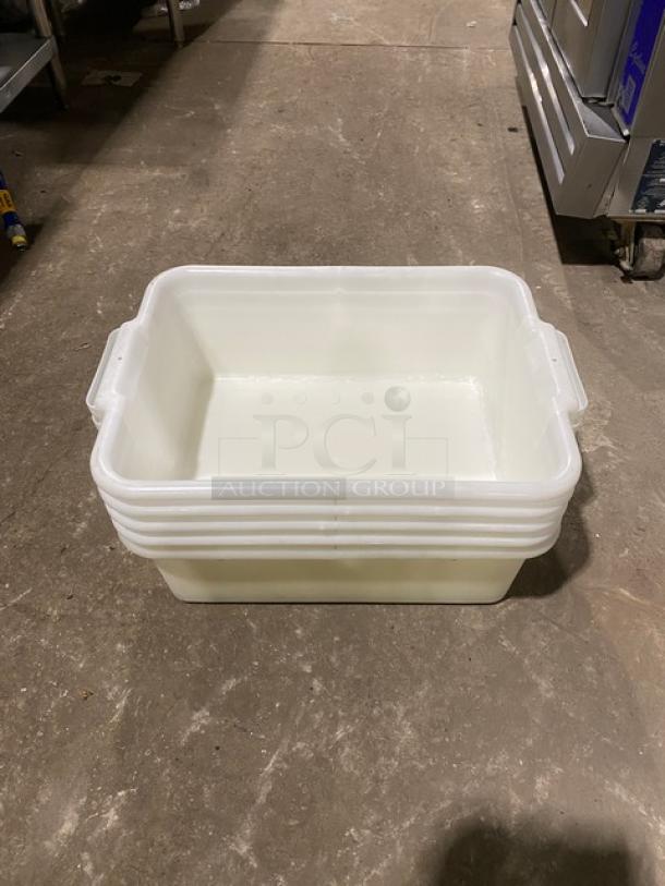 White rectangular commercial food storage container with handles, used, stackable design, suitable for kitchen storage.