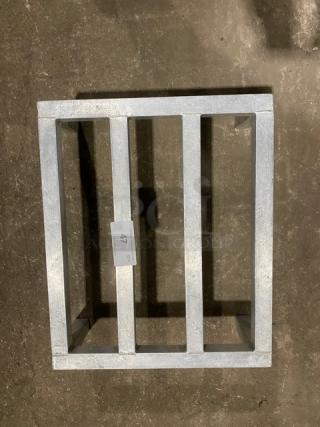 Commercial heavy-duty dunnage rack on legs, metal construction, showing tag with number 47, used for storage and organization.