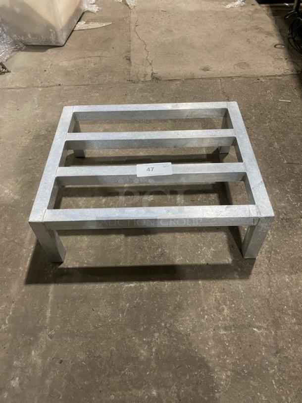 Commercial heavy-duty dunnage rack with legs, metal construction, rectangular shape, good condition, item number 47 displayed.