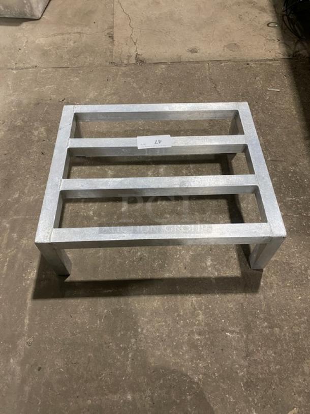 Commercial heavy-duty dunnage rack on legs, metal construction, excellent condition, ideal for storage, visible price tag.