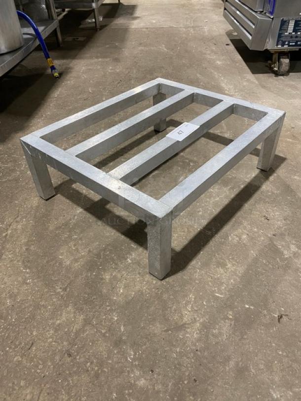 Commercial heavy-duty dunnage rack on legs, metal construction, rectangular design, excellent condition.