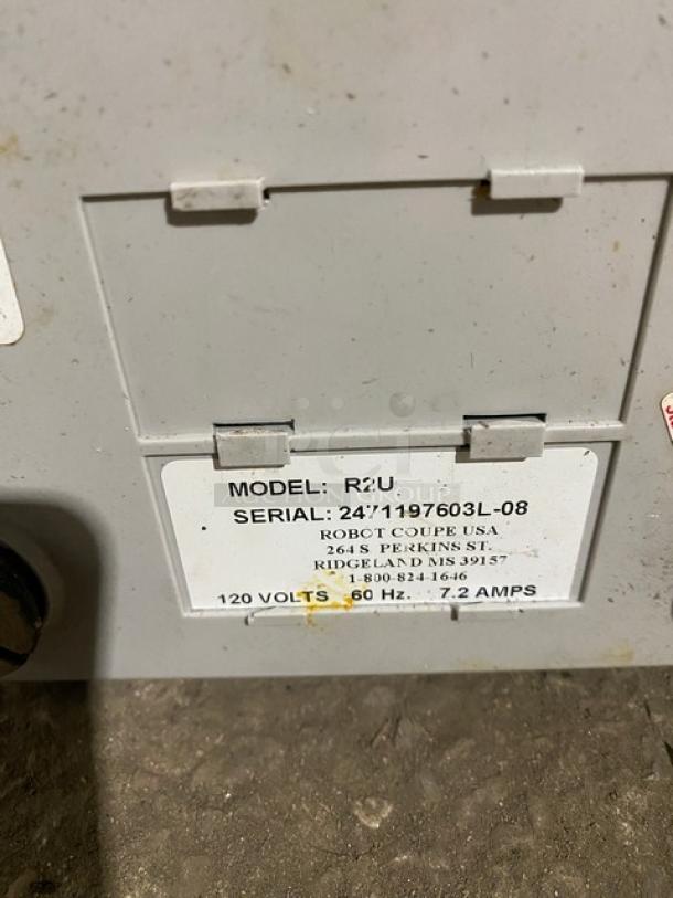 Robot Coupe R2U commercial 3 Qt. cutter/mixer; Model: R2U, SN: 2471197603L-08. 120V, 7.2A; visible label with specs.