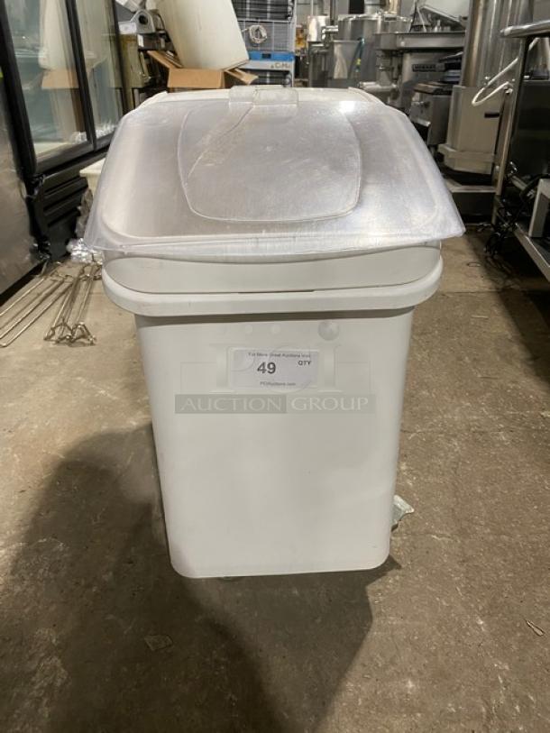 Commercial white portable food ingredient bin with clear lid, on casters. Label indicates "49 QTY." Ideal for kitchen use.