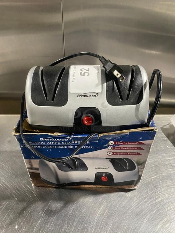 Brentwood TS1001 electric knife sharpener, 2-stage sharpening, 120V, used condition, visible power cord, original packaging.