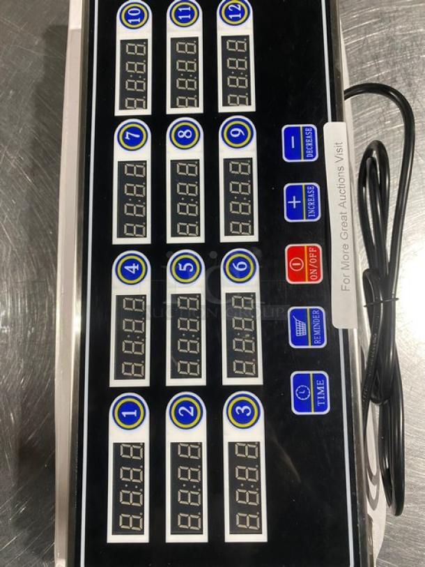 Yooyist JSQ012 12-Channel Digital Kitchen Timer, stainless steel, new condition, features digital display and rubber buttons.