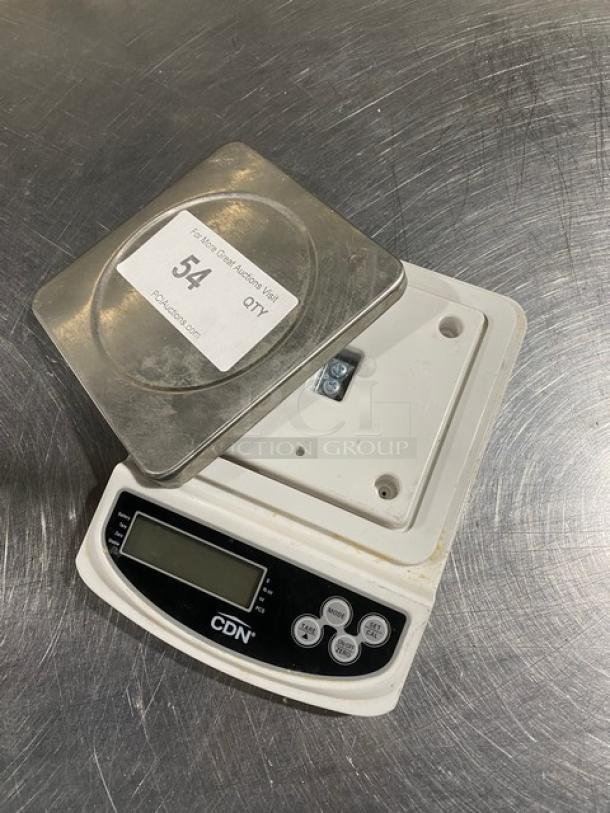 CDN Commercial 22 Lb Digital Scale, Model SD2206, showing digital display and control buttons, label with lot number 54 visible.