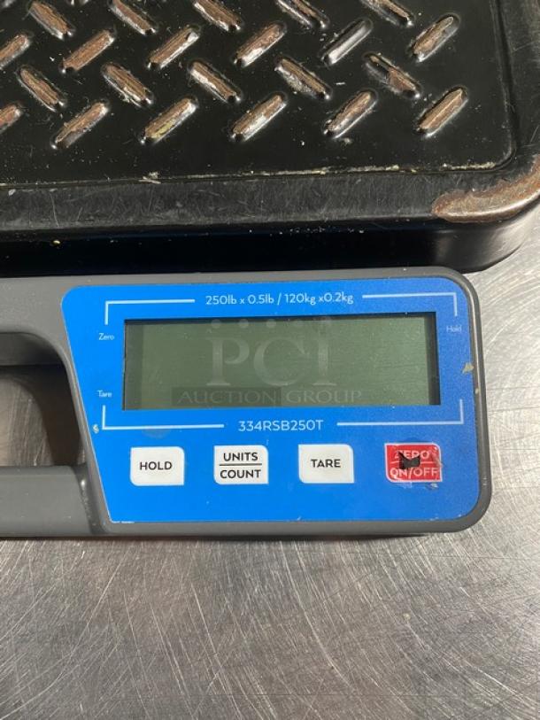 Ava Weigh 334RSB250T digital receiving scale, 250 lb. capacity, features handle and digital display, in good condition.