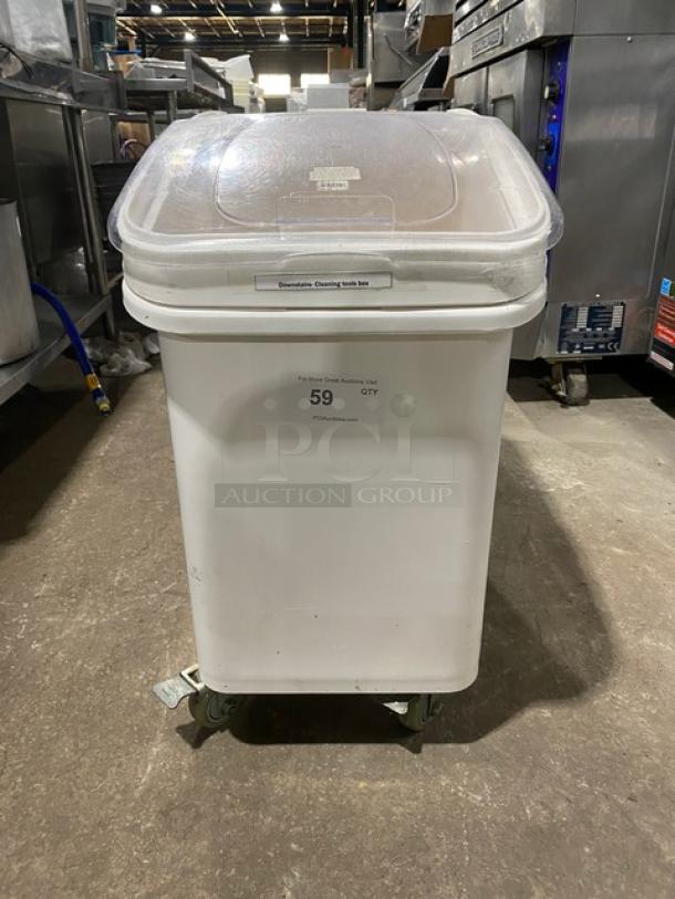 Winco commercial white food storage bin on casters, clear lid, visible label for organization. Used condition.