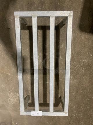 Commercial heavy-duty dunnage rack on legs, metal construction, suitable for storage, industrial-grade durability.