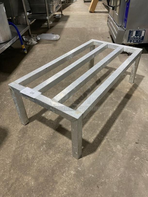 Commercial heavy-duty dunnage rack, metal, on legs, excellent condition. Ideal for industrial storage.