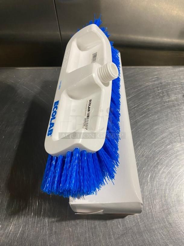 Ecolab commercial dual surface deck brush, white with blue bristles, on box. Features Ecolab logo and threaded handle socket.