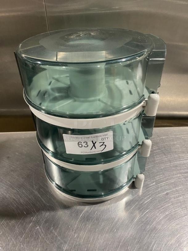 Wisconsin Tissue smoke gray paper-roll tissue dispenser, commercial model, stacked design, good condition, label marked "63 X 3".