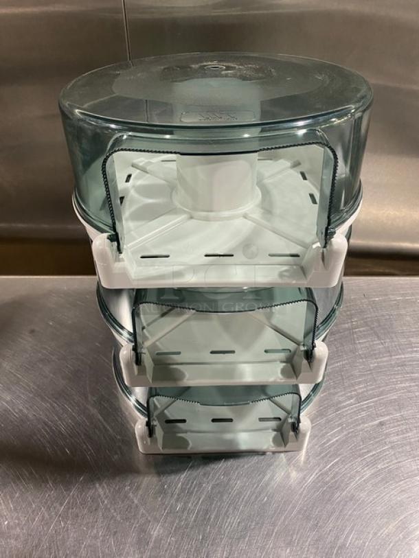 Wisconsin Tissue commercial paper-roll tissue dispenser in smoke gray, stack of three, durable plastic, excellent condition.