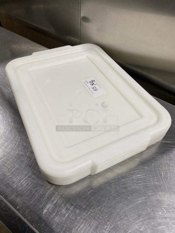 White rectangular food storage container with handled lid on stainless surface. Label reads “8X99.” Ideal for commercial use.