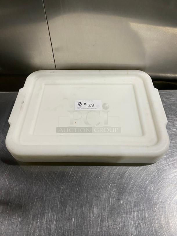 White rectangular food storage container with handled lid, label "8X L9," on stainless steel surface. Excellent condition.