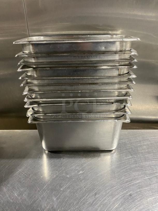 Commercial stainless steel hotel steamtable pans, stack of 11, used condition, durable build, ideal for catering use.