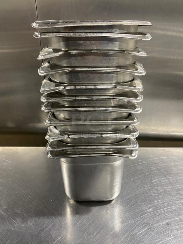 Stack of commercial stainless steel hotel pans, excellent condition, 11 pans total, suitable for steaming or buffet use.