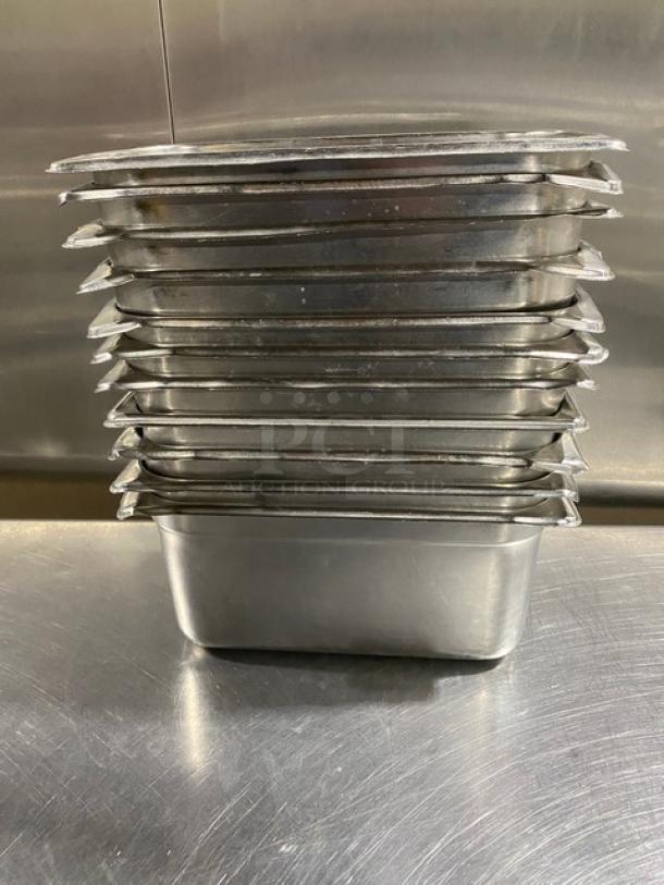 Stack of commercial stainless steel hotel steamtable pans, excellent condition, 11 pieces, each with clean, polished surfaces.