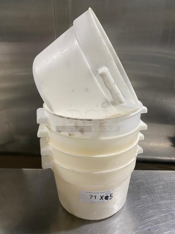 Commercial white round food storage containers with handles, stacked. Used condition, label marked "71 X 5."
