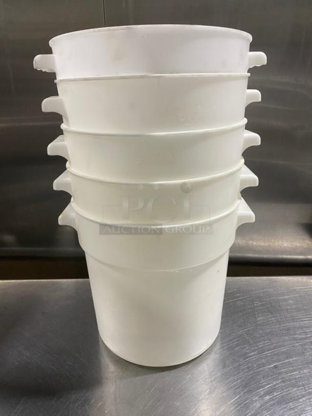 Stack of commercial white round food storage containers with handles in good condition. Five containers included.