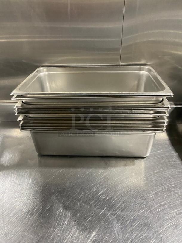 Stack of commercial stainless steel hotel steamtable pans, excellent condition, durable and ideal for catering.