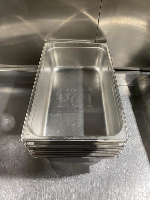 Stainless steel hotel steamtable pan, commercial grade, stackable, reflective finish, in excellent condition.