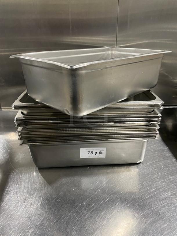 Stack of commercial stainless steel hotel steamtable pans in good condition, featuring a visible label marked "78 x 18".