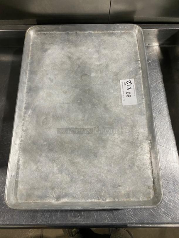 Commercial baking sheet pan, heavy-duty aluminum, 12x18 inches, used condition. Marked "Lot 08 12X" for auction.