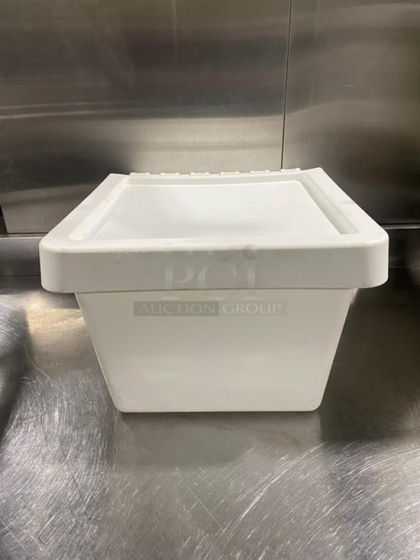Commercial white stackable countertop food ingredient bin. Durable plastic construction, good condition, ideal for storage.