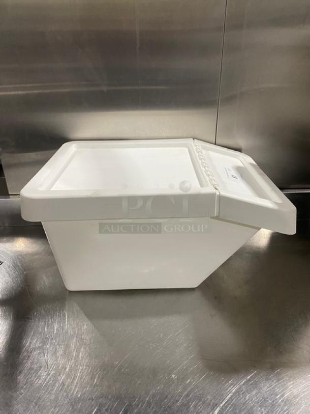 White stackable countertop food ingredient bin in good condition, with a secure lid and durable design for commercial use.