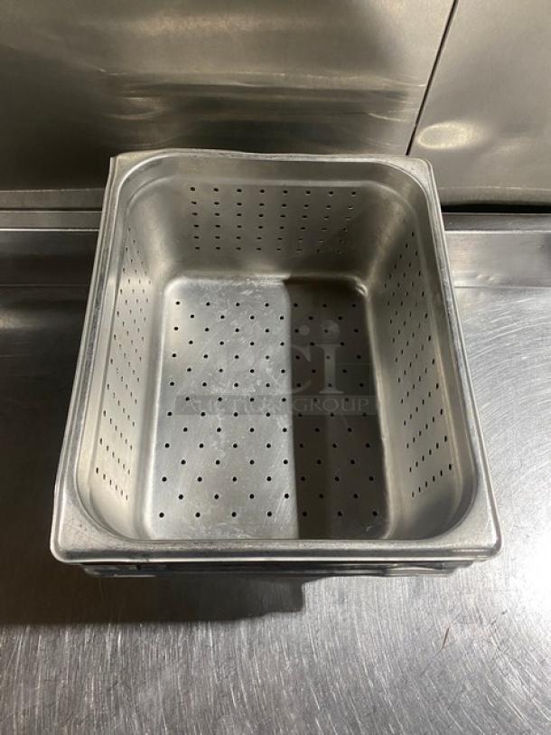 Commercial stainless steel perforated hotel pan, excellent condition, ideal for steam tables, multiple hole design for drainage.