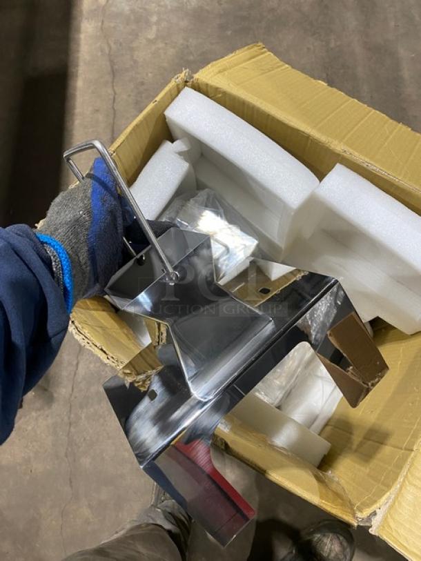 American Eagle stainless steel meat cutting attachment in box, new condition, includes foam packaging and metal components.