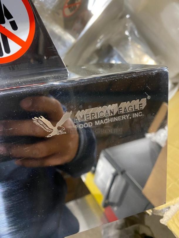 American Eagle stainless steel meat cutting attachment, unused in box, branded with logo, ideal for commercial use.