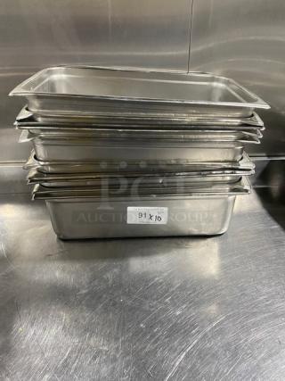 Stack of commercial stainless steel hotel pans in good condition, labeled with "91 X 10" for quantity.