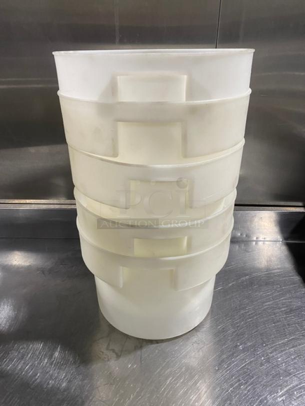 Commercial white round food storage containers with handles, stackable design. Used condition, durable material.