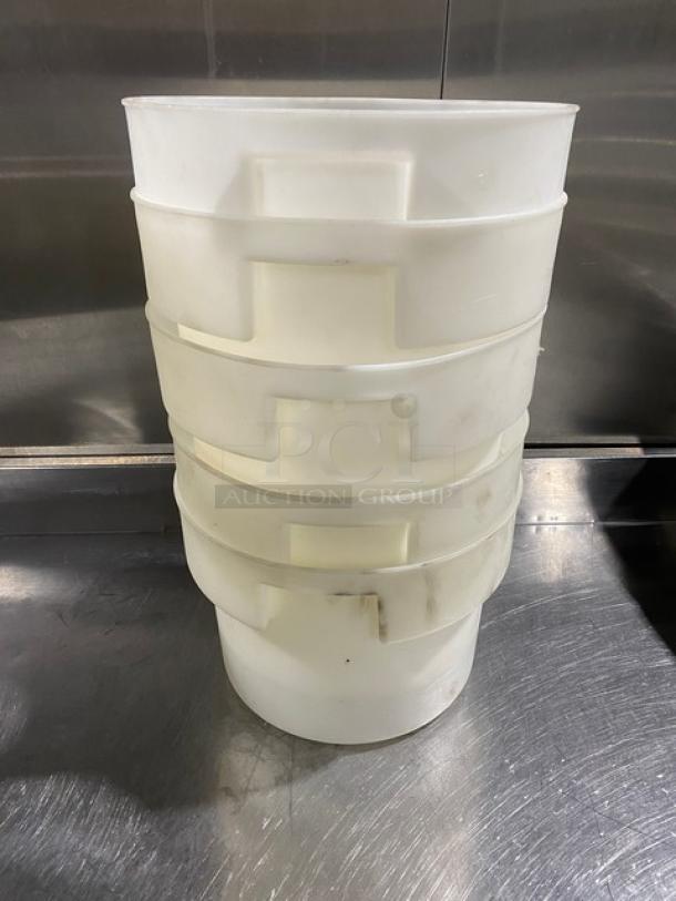 Commercial white round food storage container with handles, stackable, used condition. Ideal for bulk storage solutions.