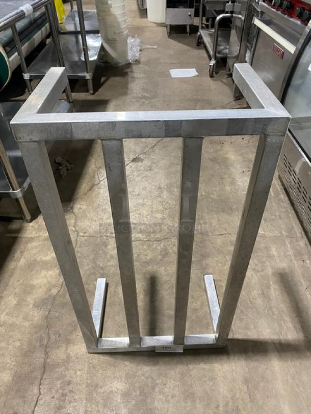 Commercial heavy-duty dunnage rack on legs, metal construction, sturdy condition, ideal for storage and organization.