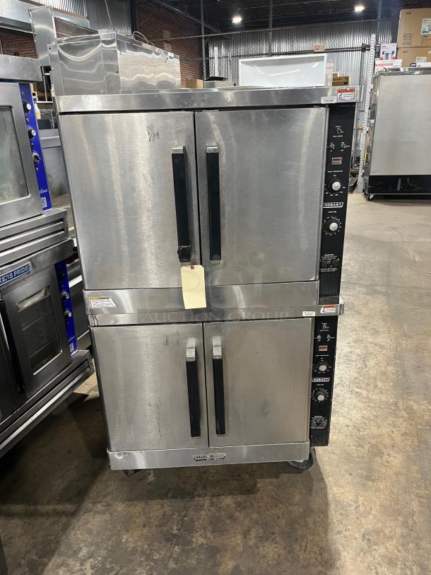 Hobart stainless steel double-stacked convection oven on casters, electric powered, with wired oven rack, used condition.