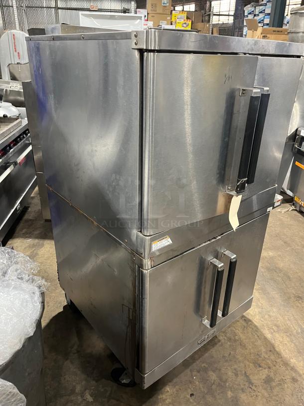Hobart stainless steel double-stacked convection oven with wired rack and casters, electric powered, commercial use.