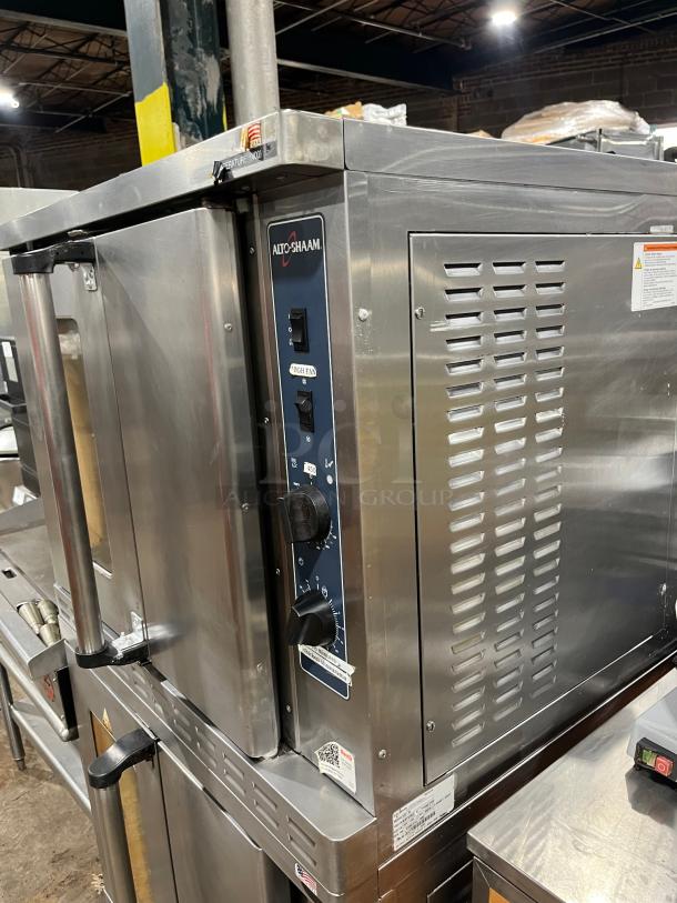 Alto-Shaam ASC-4G stainless steel double convection oven, 2018 model, natural gas, thermostatic controls, on casters.