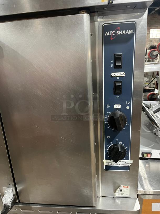 Alto-Shaam ASC4G convection oven, stainless steel, natural gas, thermostatic controls, wired rack, on casters.